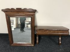 A Victorian mahogany wall mirror with shelf