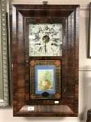 A late nineteenth century Waterbury Clock Company wall clock in rosewood veneered case