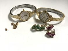 A box of two pairs of 9ct gold earrings together with two Lady's Rotary wrist watches and a small