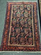 A Persian Ghom design rug,