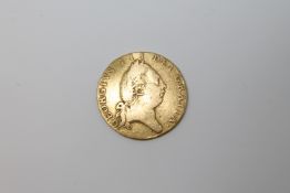 A George III half guinea 1790,