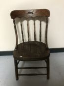 An antique kitchen chair