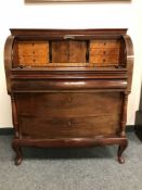 A nineteenth century inlaid mahogany cylinder bureau,