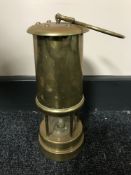 A brass miner's lamp