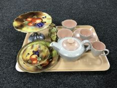 A tray of nine piece Poole pottery tea for two together with four pieces of gilded hand painted