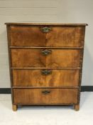 An antique four drawer chest