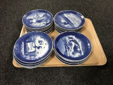 A tray containing twenty three Royal Copenhagen calendar plates