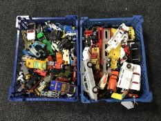 Two baskets containing play-worn die cast vehicles