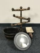 A wooden six way candle holder, porthole mirror,