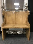 A reclaimed pine pew,