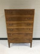 A 20th century walnut six drawer chest