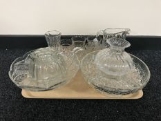 A tray of glass ware, cut glass water jug and beakers, comport,
