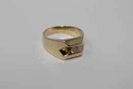 An 18ct gold solitaire diamond ring, approximately 0.6ct, size R.