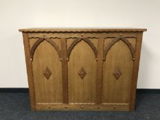 A 20th century oak church style altar