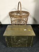 A brass embossed coal box with liner together with a wicker log basket
