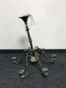 A continental brass six way chandelier