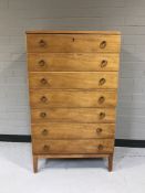 A 20th century mahogany seven drawer chest