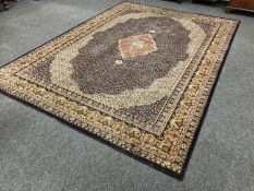 A Turkish machine made carpet on blue ground,