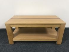 An oak two tier coffee table