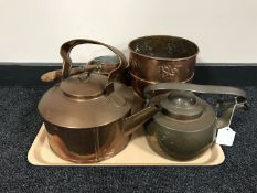 A tray of vintage copper kettles,
