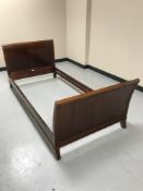 A mahogany 3' bed frame