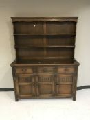 A triple door oak dresser