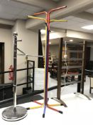 A heated towel rail together with a contemporary hat and coast stand,