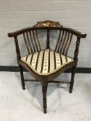 A nineteenth century inlaid mahogany corner chair,