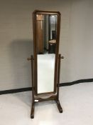 A contemporary cheval mirror