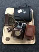 A set of cased Boots binoculars together with assorted vintage cameras including a Praktiflex,