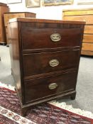 A George III mahogany three drawer chest,