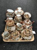 A tray of two Japanese eggshell tea services