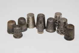 A collection of silver thimbles (10)