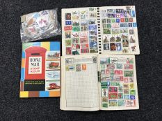Three stamp albums with stamps and a quantity of loose stamps