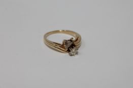 A 14ct gold diamond set ring
