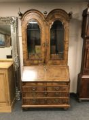 A 19th century Queen Anne style walnut bureau bookcase,