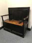 A 17th century oak storage settle CONDITION REPORT: This measures 98cm high,