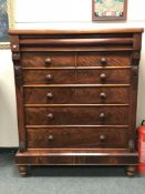 A Victorian mahogany seven drawer chest,
