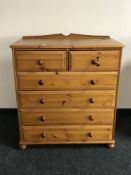 A pine six drawer chest