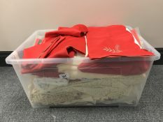 A box containing assorted table linen