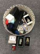 A hat box containing a quantity of assorted wristwatches and boxed costume jewellery