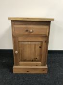 A reclaimed pine cupboard fitted a drawer
