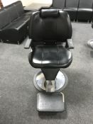 A hydraulic barber's chair