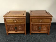 A pair of oriental style hardwood cabinets fitted a drawer
