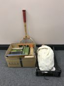 A box containing books, novels, etc .