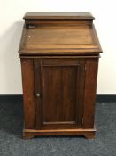 An antique mahogany clerks desk