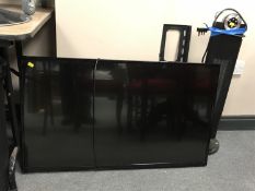 A Digihome 43 inch LCD TV with remote and wall mounting bracket and a Dimplex heater with remote