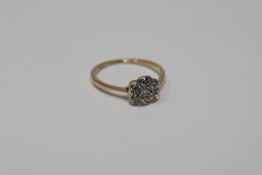 An 18ct gold diamond cluster ring CONDITION REPORT: The ring is in good condition.
