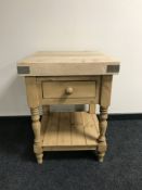 A reclaimed pine butcher's block fitted a drawer