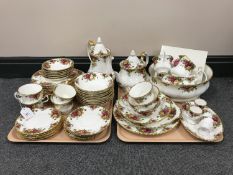 Sixty pieces of Royal Albert Old Country Roses tea and dinner ware and a set of boxed teaspoons